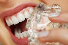 Woman chewing ice